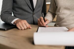 Legal professional working with a commercial landlord to sign a contract