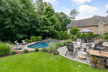 The garden in a luxury residential property with a swimming pool